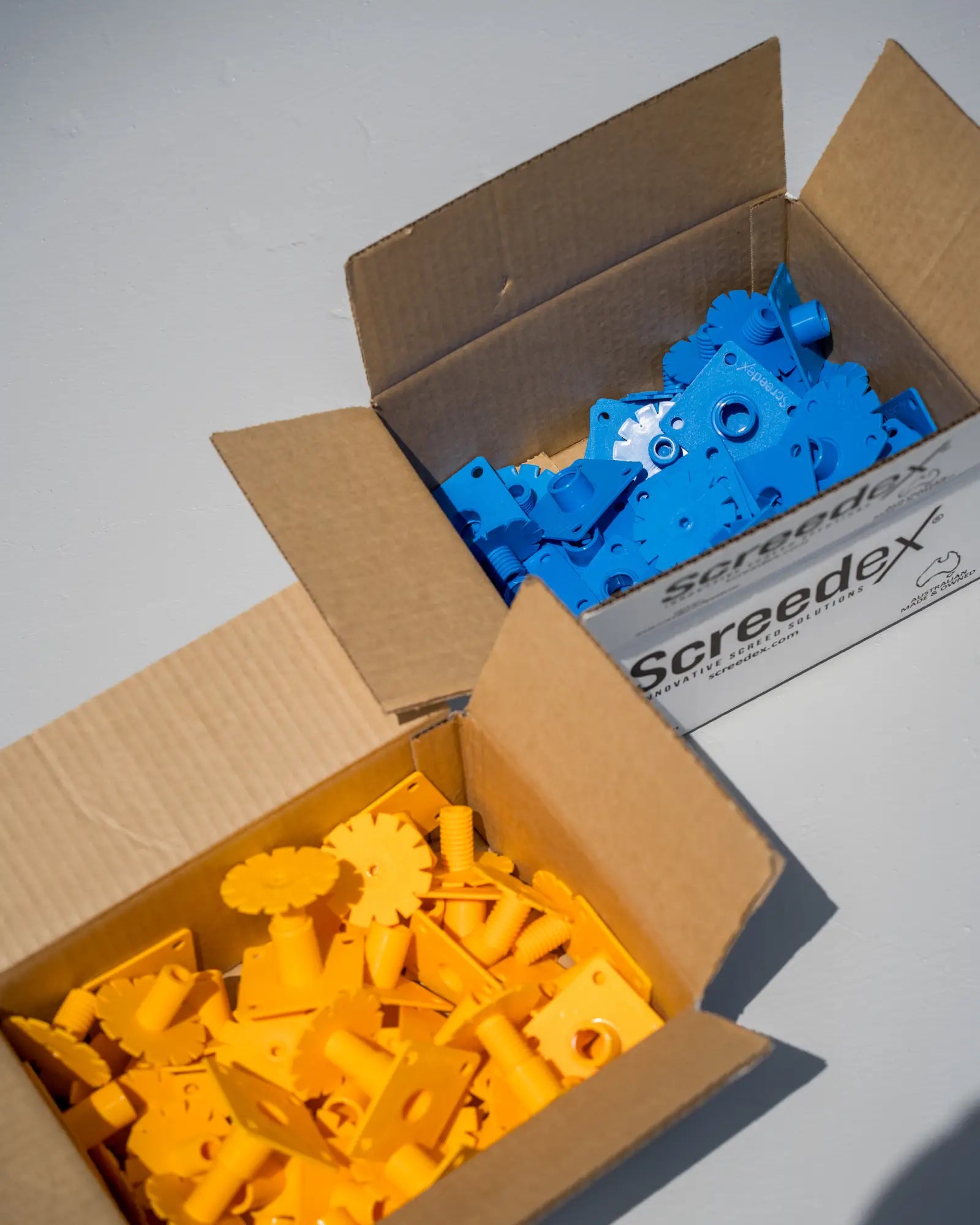 Screedex® adjustable floor screed platform systems in bulk ready for distribution to stockists and tile tool retailers